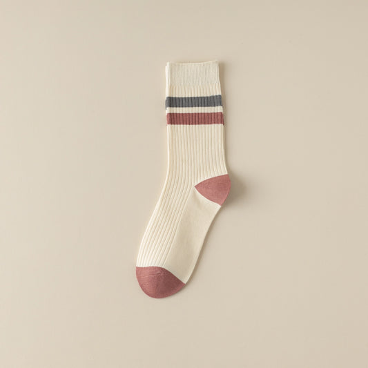 Women's cream cotton socks with retro stripes in burgundy, navy, and grey – laid flat on a beige background