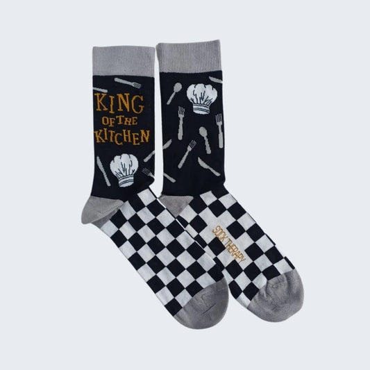 Flat lay of King of the Kitchen bamboo socks with checkerboard design