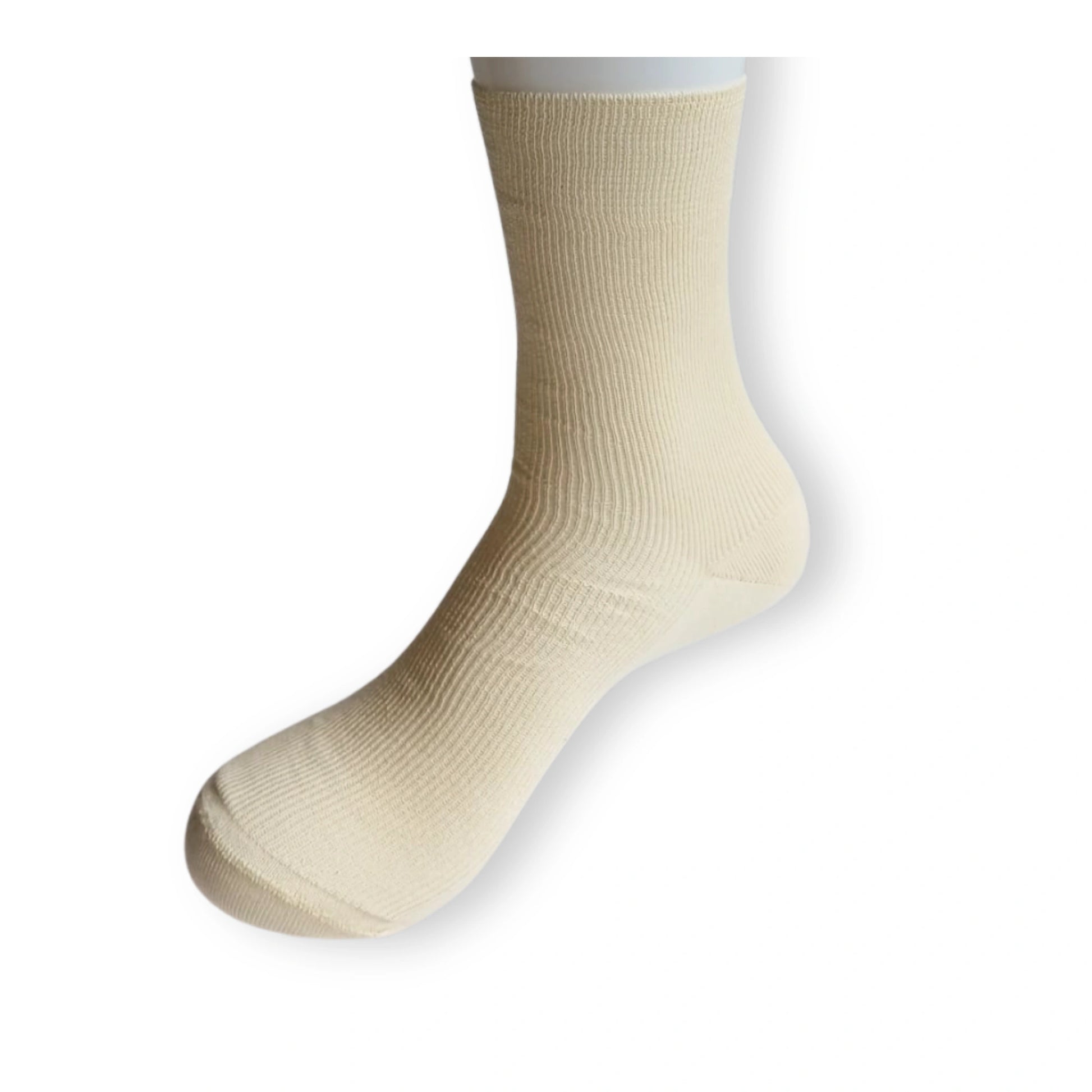 Laura organic cotton sock in undyed cream on mannequin leg