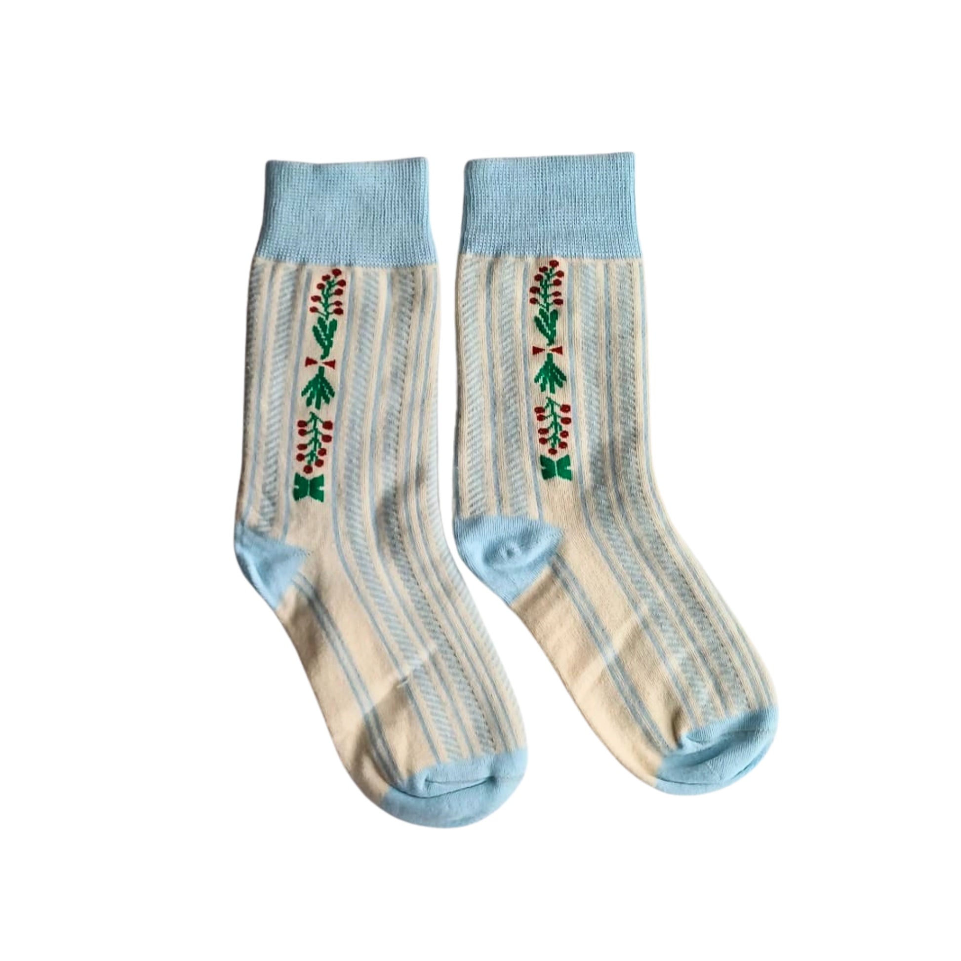Pair of retro blue floral cotton socks with cream and blue stripes, flat lay view