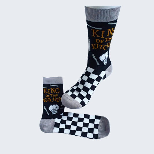 Displayed King of the Kitchen bamboo socks showing chef’s hat and checkerboard pattern