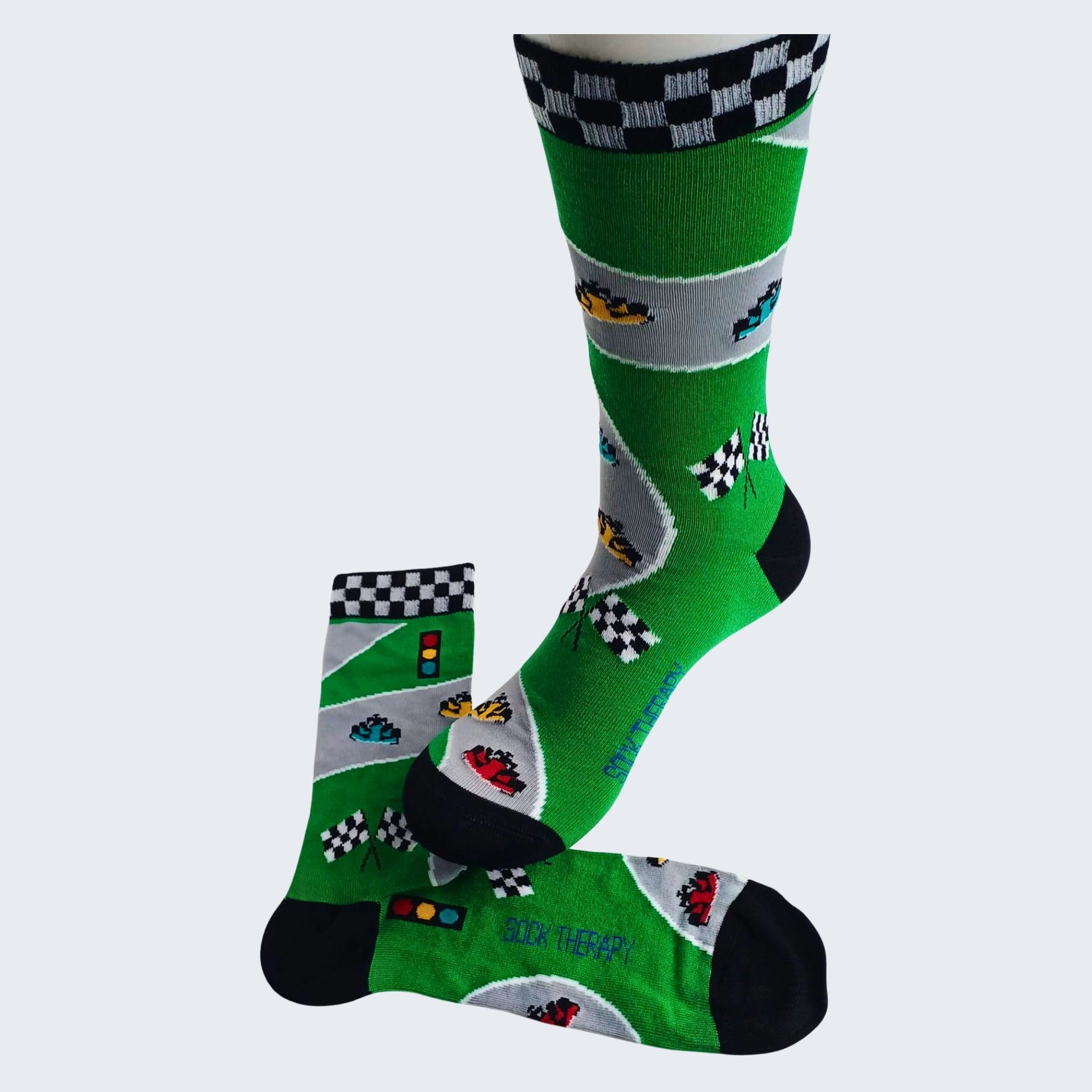 Formula 1 bamboo socks displayed upright showing full racing track pattern